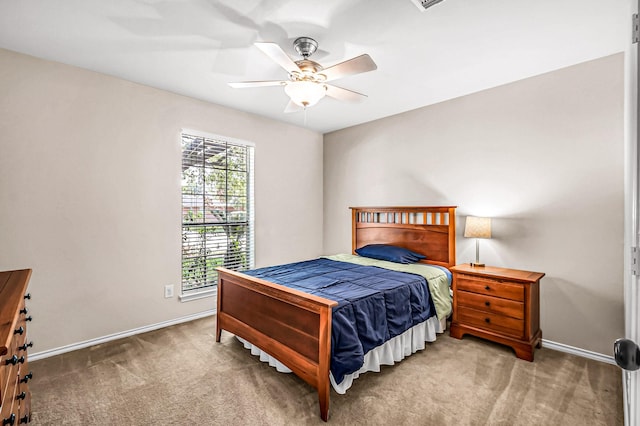 bedroom featuring ceiling fan and carpet flooring