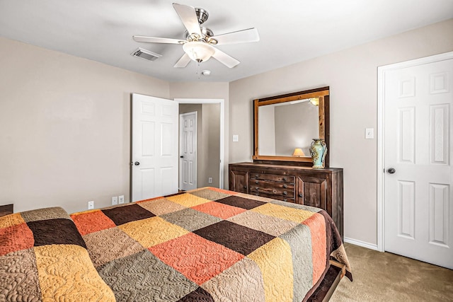 bedroom with ceiling fan and carpet flooring