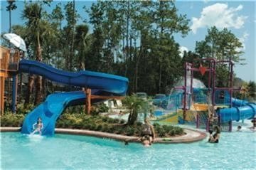 view of pool featuring a playground