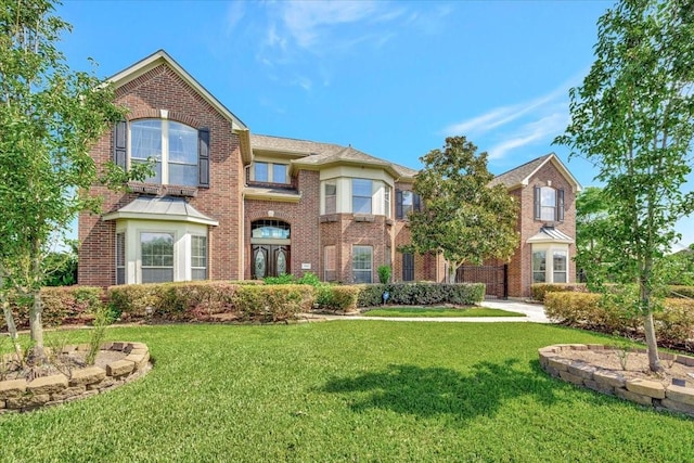 view of front of property with a front lawn