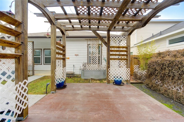 view of patio featuring a pergola