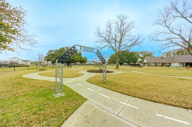 view of home's community featuring a yard