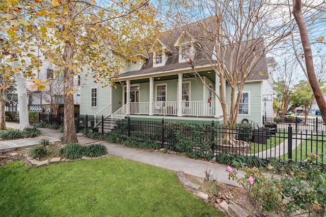 cape cod-style house with a porch and a front yard