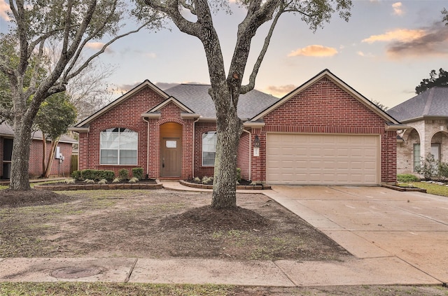 view of front of property featuring a garage