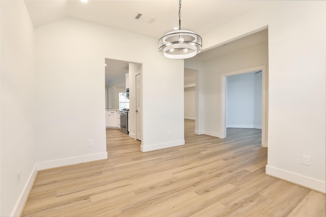 unfurnished dining area featuring light hardwood / wood-style floors