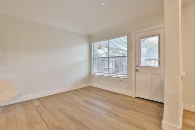 entryway with light hardwood / wood-style floors