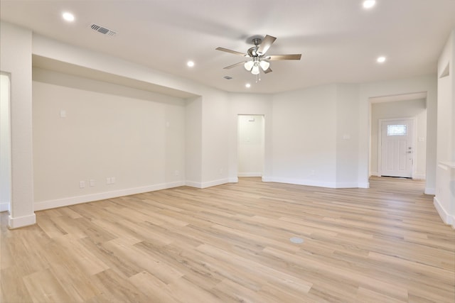 interior space with ceiling fan and light wood-type flooring