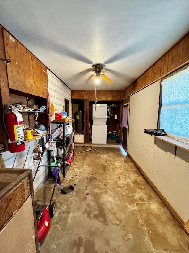 interior space featuring water heater and ceiling fan