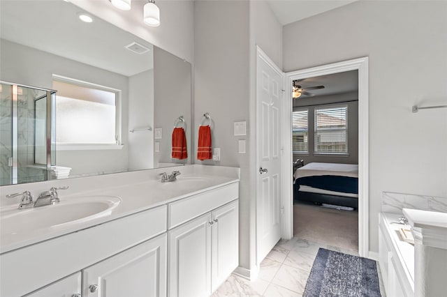 bathroom featuring ceiling fan, a shower with door, and vanity