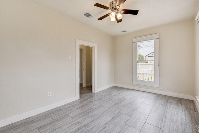 empty room featuring ceiling fan