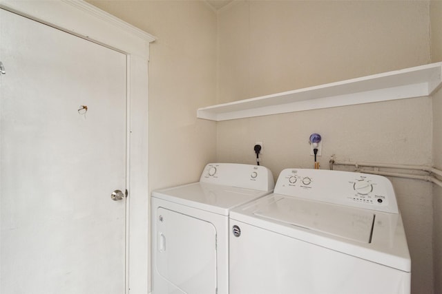 washroom featuring independent washer and dryer