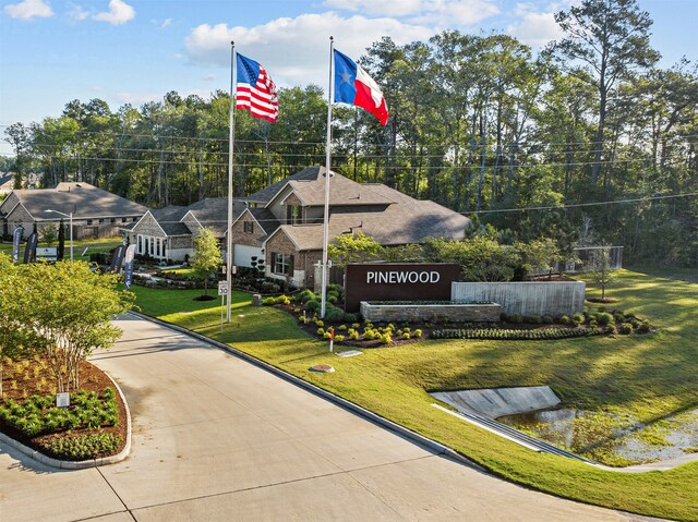 surrounding community with a lawn
