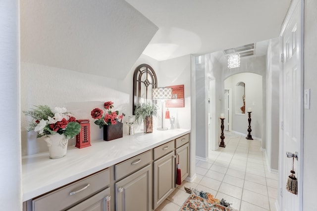 bathroom with vanity and tile patterned floors