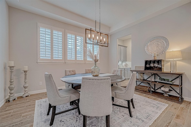 dining room with a chandelier