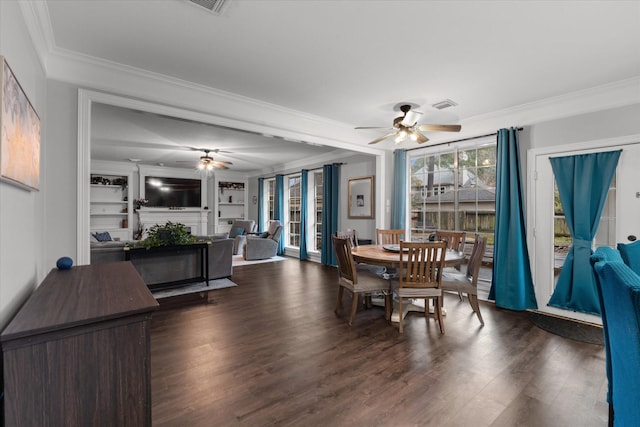 dining area featuring crown molding, ceiling fan, dark hardwood / wood-style floors, and built in features