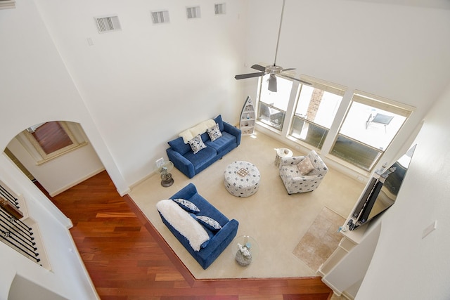 living room featuring ceiling fan