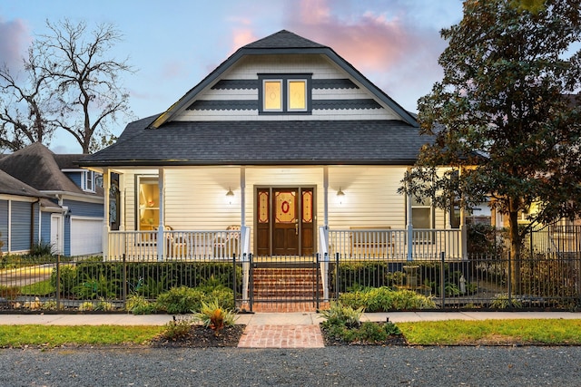 bungalow featuring covered porch