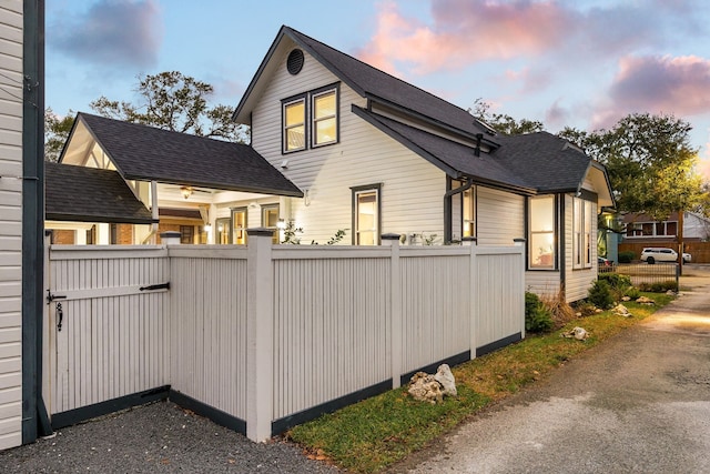 view of property exterior at dusk