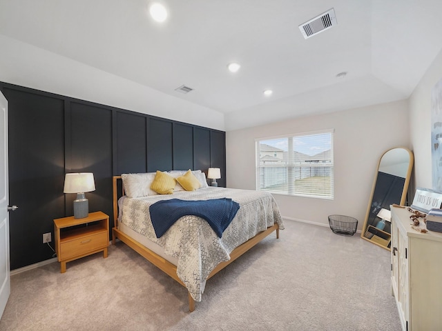 bedroom with light carpet