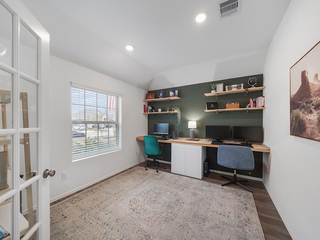 home office featuring french doors, wood-type flooring, and lofted ceiling