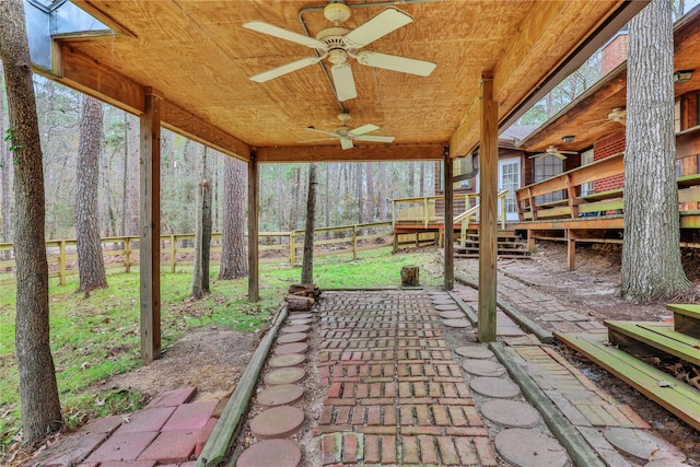 view of patio / terrace featuring ceiling fan and a deck