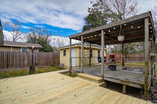 deck featuring a storage shed