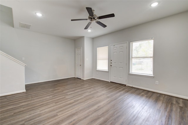 interior space with hardwood / wood-style flooring and ceiling fan