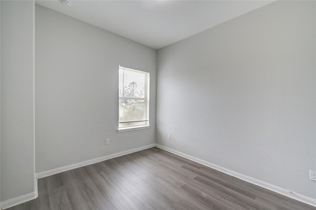 unfurnished room featuring hardwood / wood-style floors