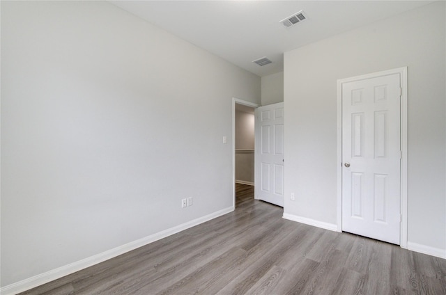 unfurnished bedroom with light hardwood / wood-style flooring