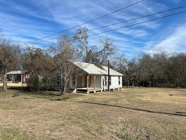 view of home's exterior featuring a yard