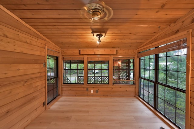 unfurnished sunroom with vaulted ceiling and wooden ceiling