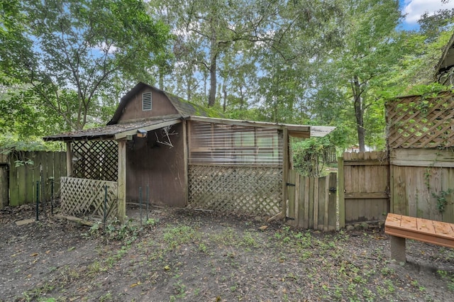 view of outdoor structure with an outdoor structure and fence