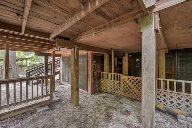 view of patio featuring an outbuilding and an exterior structure