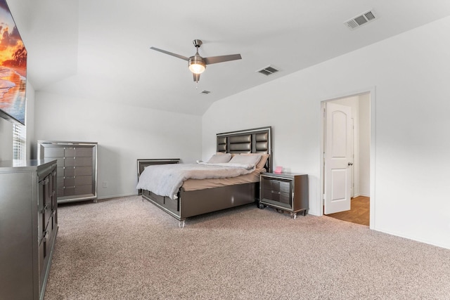 carpeted bedroom featuring lofted ceiling and ceiling fan