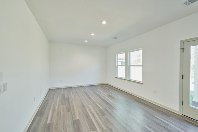 empty room featuring light hardwood / wood-style floors