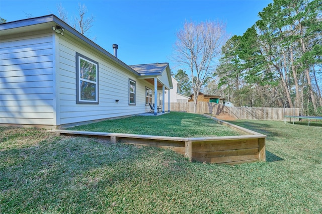 view of yard with a trampoline