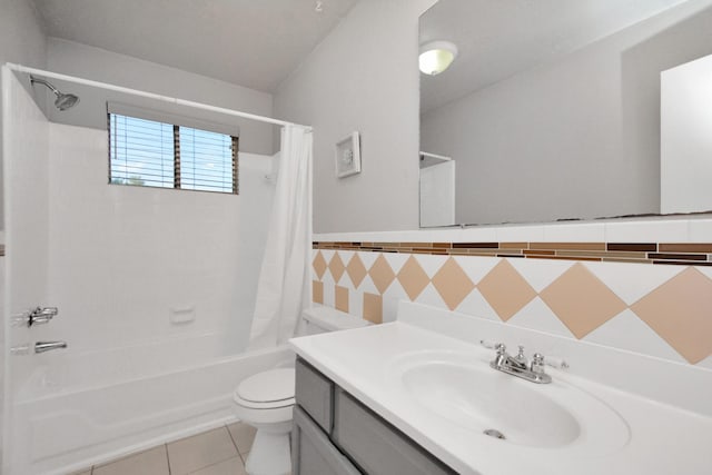 full bathroom featuring tile patterned floors, toilet, shower / tub combo, tile walls, and vanity