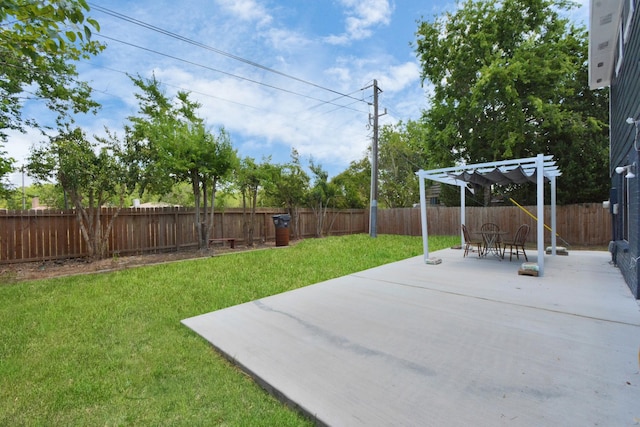 view of yard with a pergola and a patio