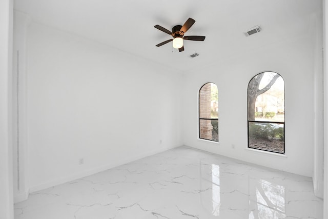 spare room featuring ceiling fan