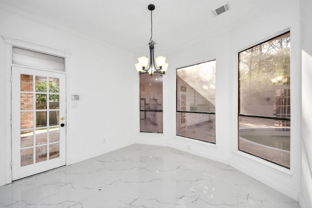 unfurnished dining area with a notable chandelier