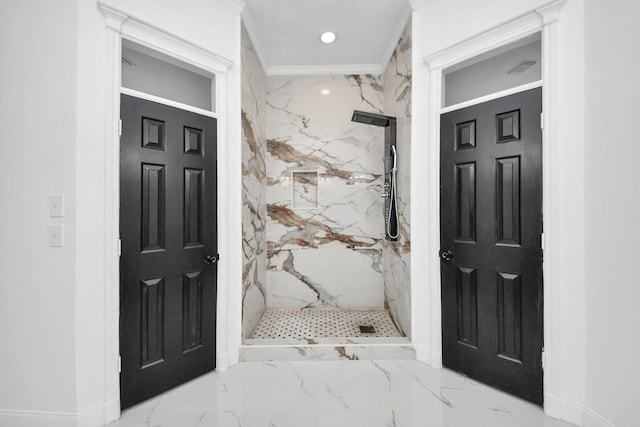 bathroom with tiled shower