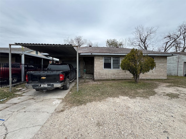 view of front of house with a carport