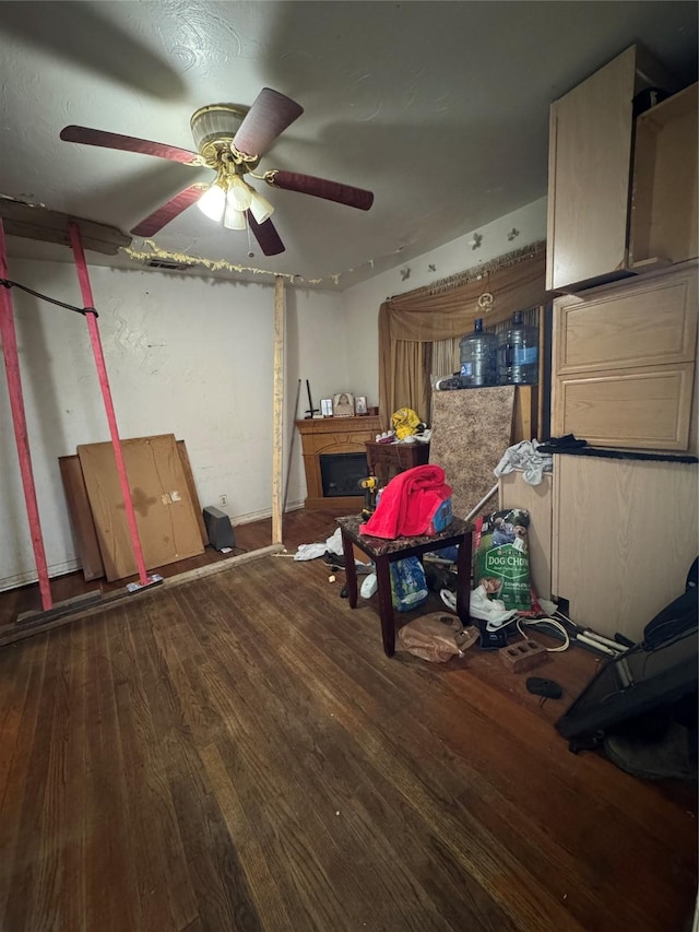 misc room with ceiling fan and hardwood / wood-style floors