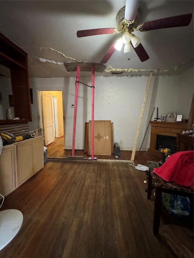 interior space featuring ceiling fan and wood-type flooring