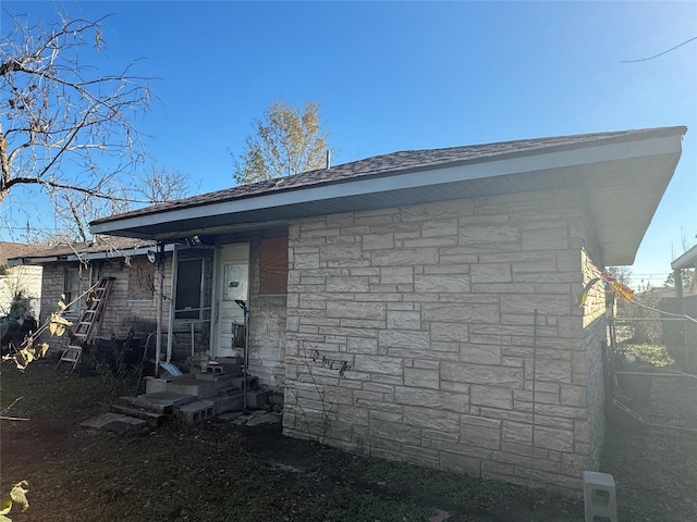 view of front facade featuring stone siding