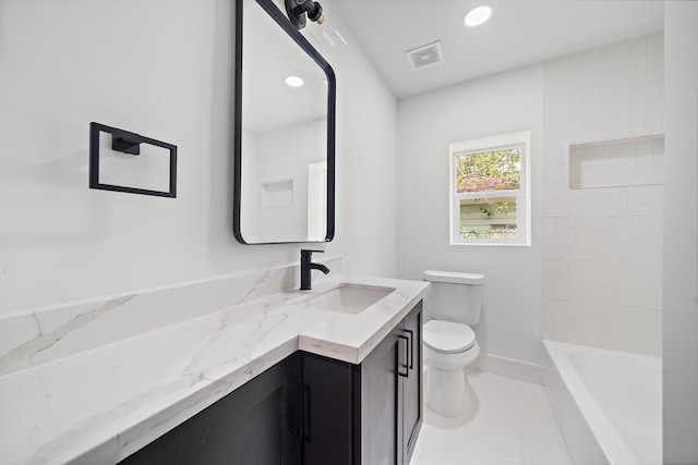 bathroom with tile patterned floors, toilet, and vanity