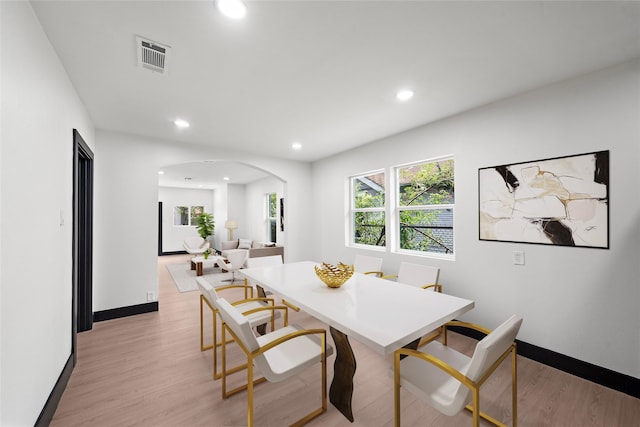 dining area with light wood-type flooring