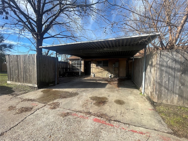 view of car parking featuring a carport