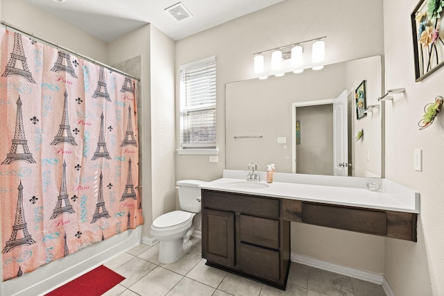 full bathroom featuring shower / bath combo with shower curtain, toilet, tile patterned floors, and vanity