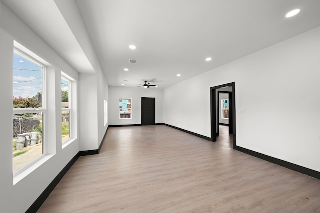 interior space featuring ceiling fan and light hardwood / wood-style flooring